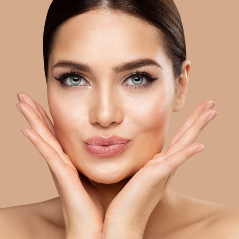 A person’s face showing natural, youthful results after a deep-plane facelift, with smooth contours and a rejuvenated appearance.