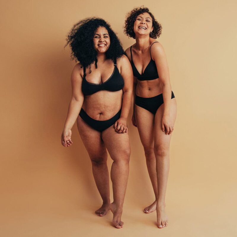 two women after their mommy makeover in milwaukee