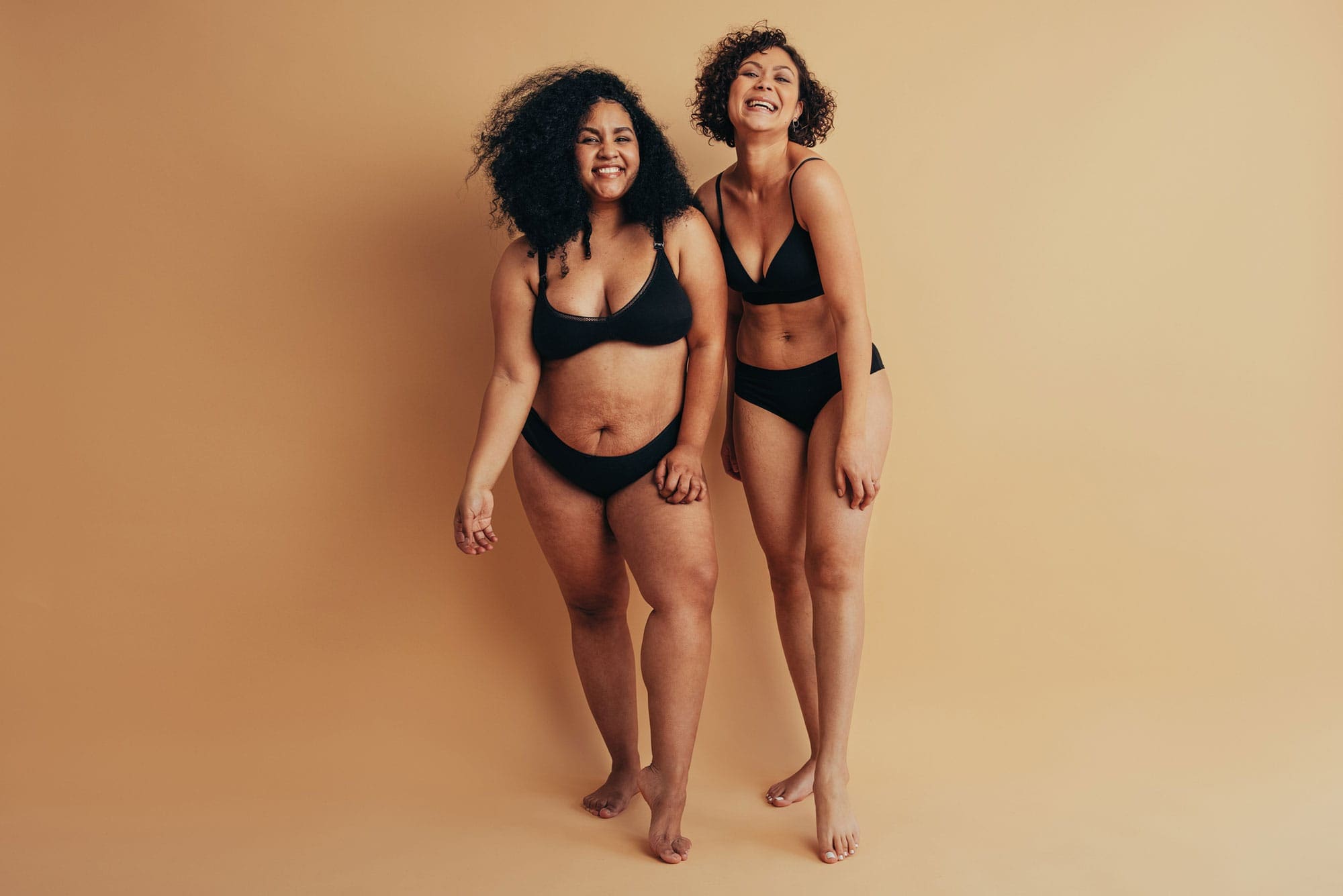 two women after their mommy makeover in milwaukee