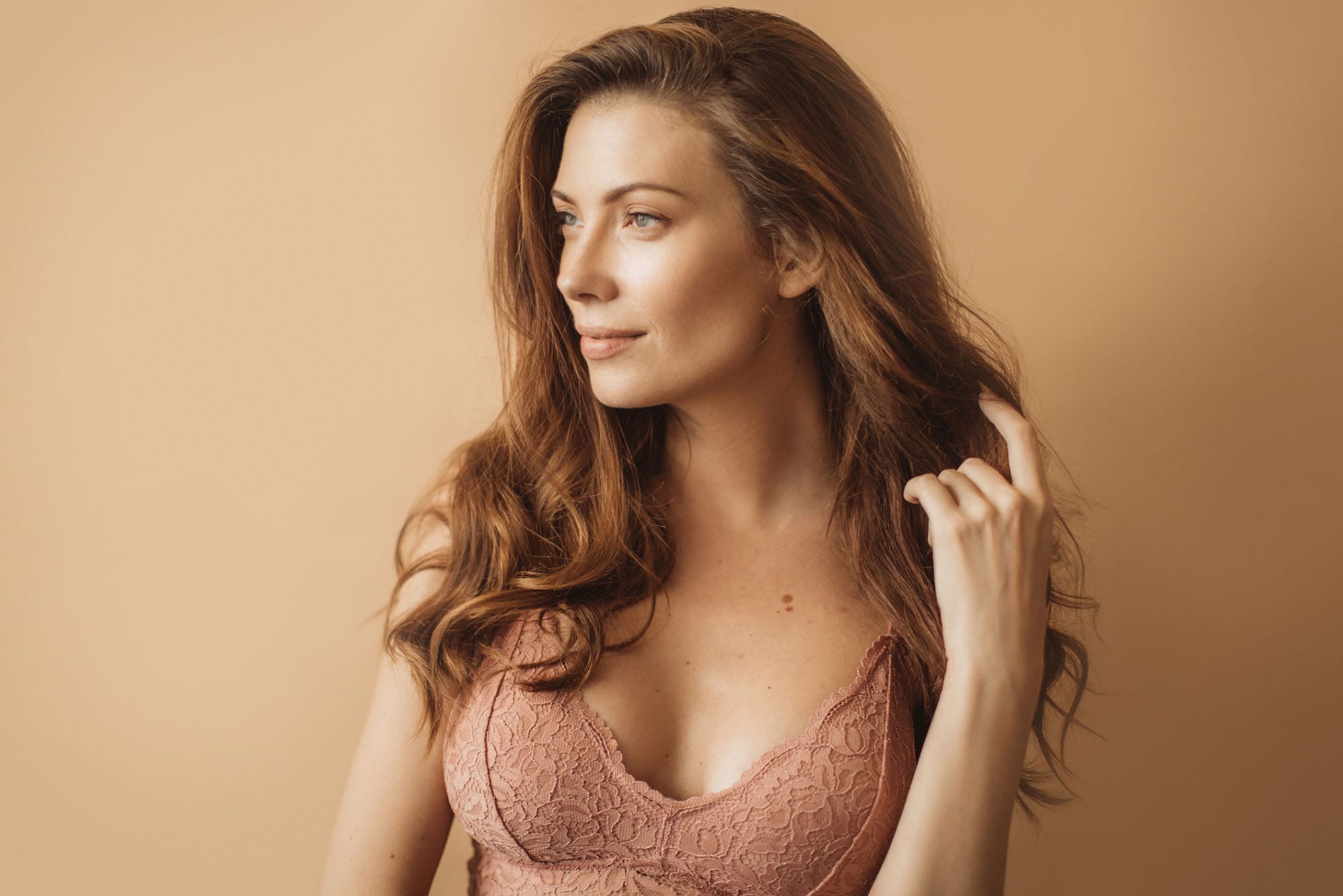 woman after her breast augmentation in Milwaukee, WI