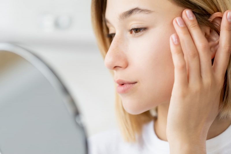 Facelift surgery repositions facial tissues for natural-looking results.